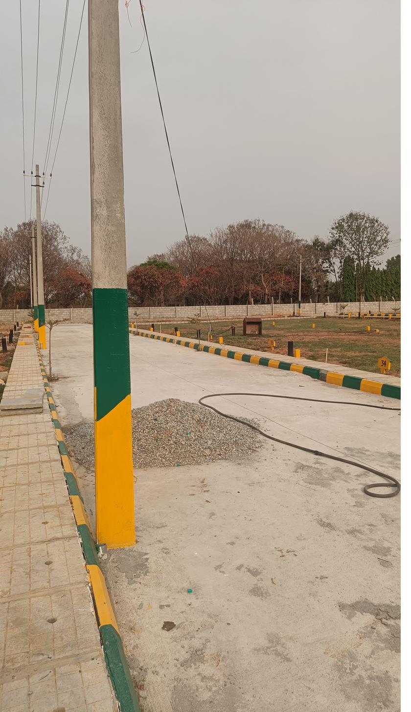 Internal road infrastructure under development at Sai Roots Layout